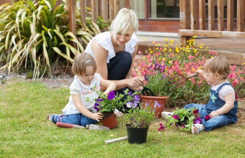 Garden maintenance crew assessing site conditions before work